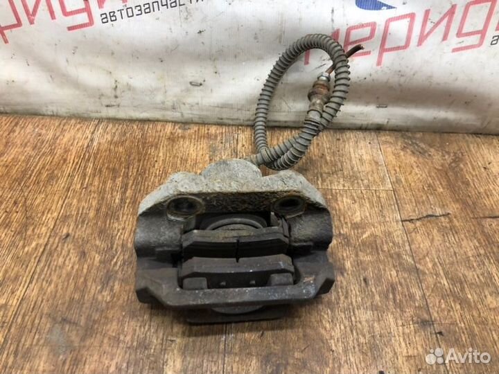 Суппорт тормозной задний левый Ssang Yong Actyon