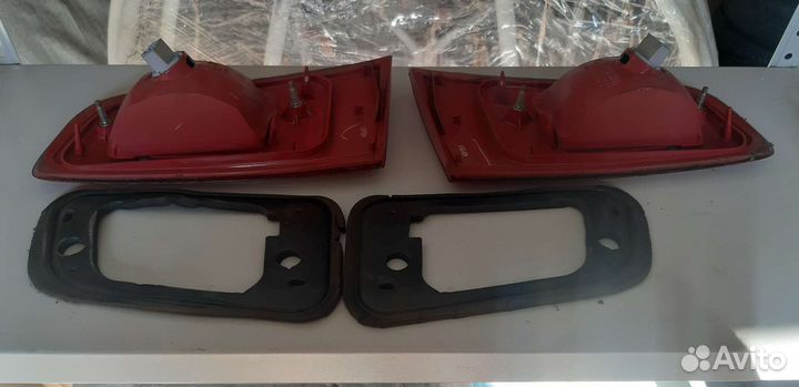 Задние фонари крышки багажника Мазда Демио