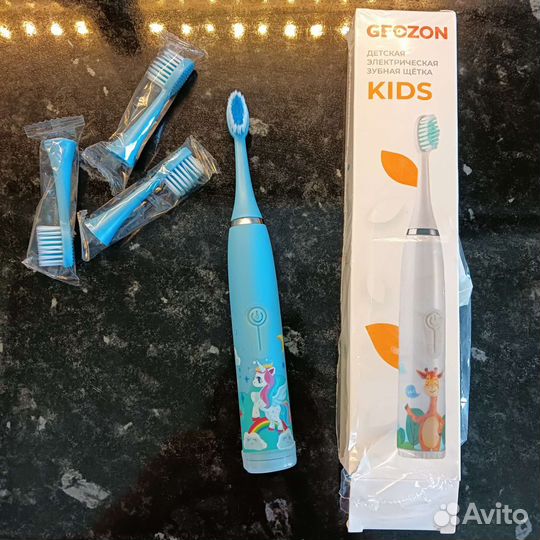 Электрическая зубная щетка