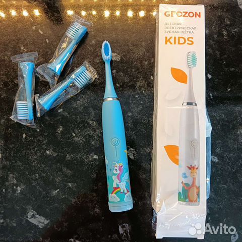 Электрическая зубная щетка