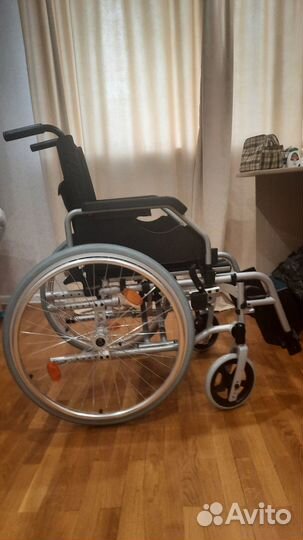 Инвалидное кресло