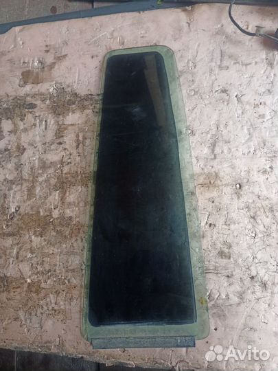 Стекло двери глухое заднее левое Zafira A