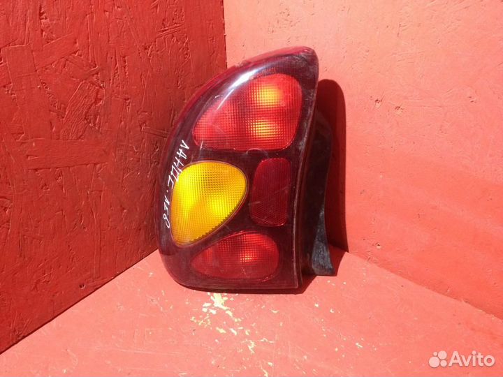 Фонарь задний левый Шевроле Ланос