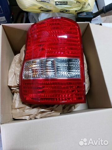 Новый задний левый фонарь Kia Carnival 02-06