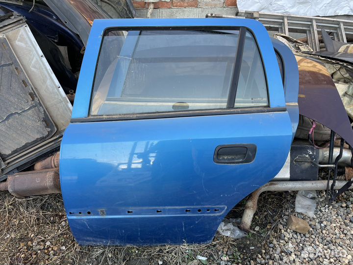 Дверь задняя левая opel astra g универсал