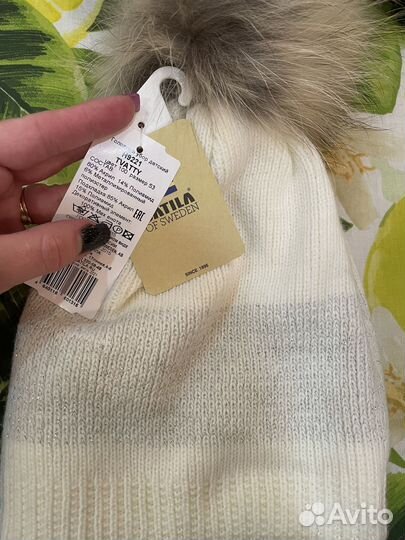 Шапки с мехом енота