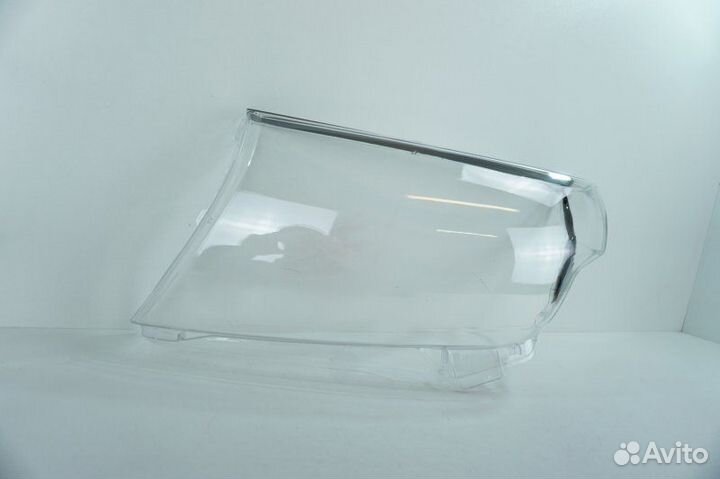 Стекло фары левое Toyota Land Cruiser 200