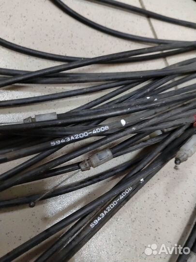 Трос лючка бензобака Mitsubishi Pajero Sport