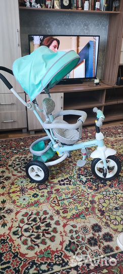 Трехколесный велосипед с ручкой