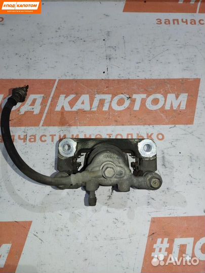 Суппорт тормозной задний левый Nissan X-Trail T31