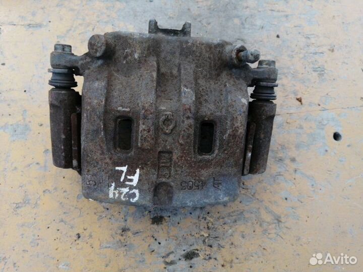 Суппорт передний левый Nissan Serena C24 QR20