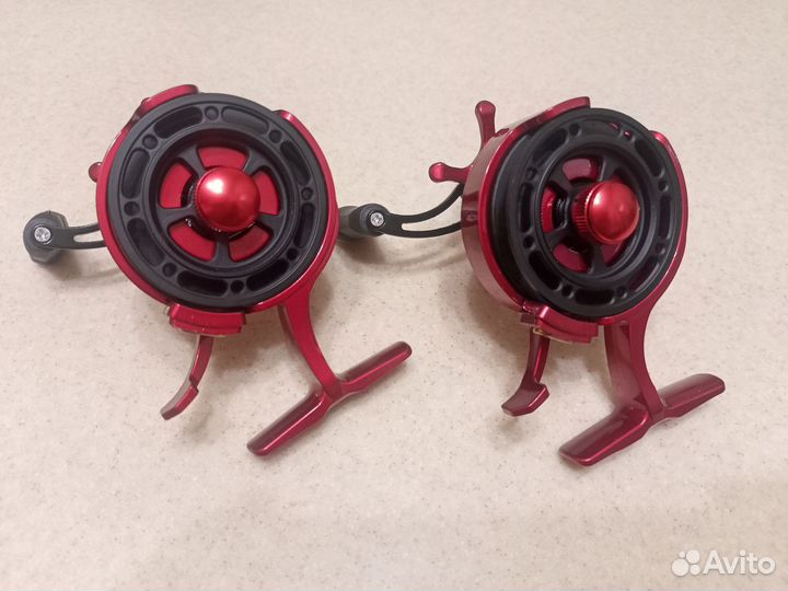 Катушка зимняя мультипликаторная с курком