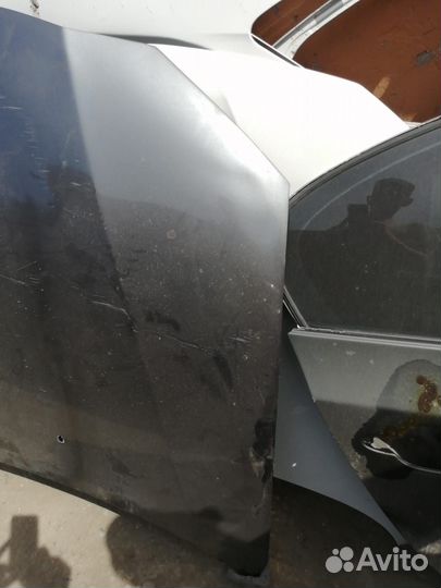 Капот Mitsubishi outlander xl 2011