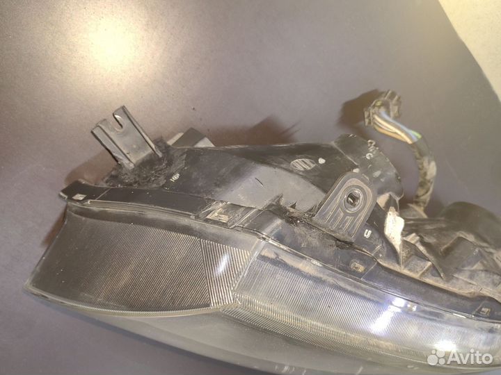 Фара левая Nissan Almera classic