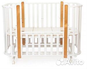 Детская кроватка с маятником