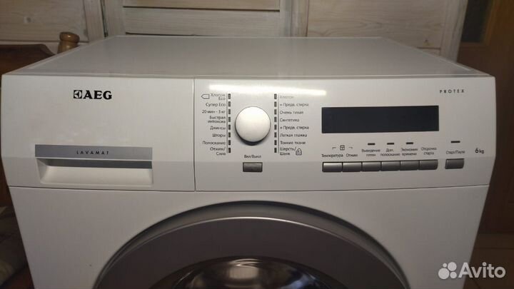 Узкая Стиральная машина AEG AMS 7000 U на 6 кг