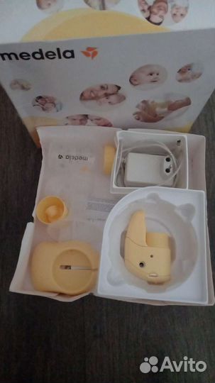 Молокоотсос medela электрический