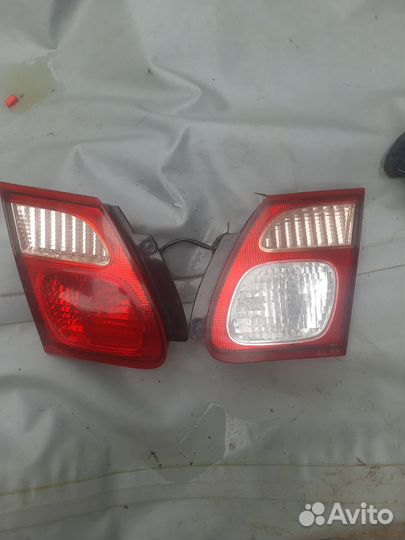 Задние фонари в крышку багажника