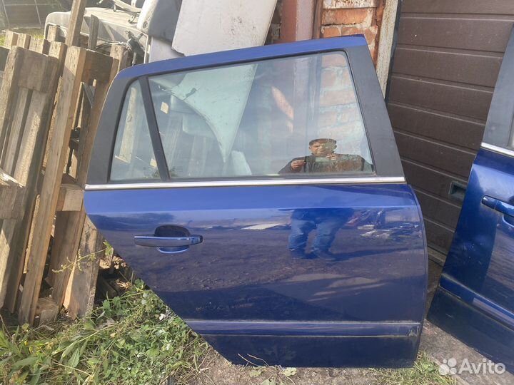 Дверь Opel Astra H
