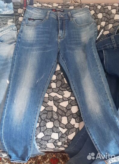 Джинсы новые
