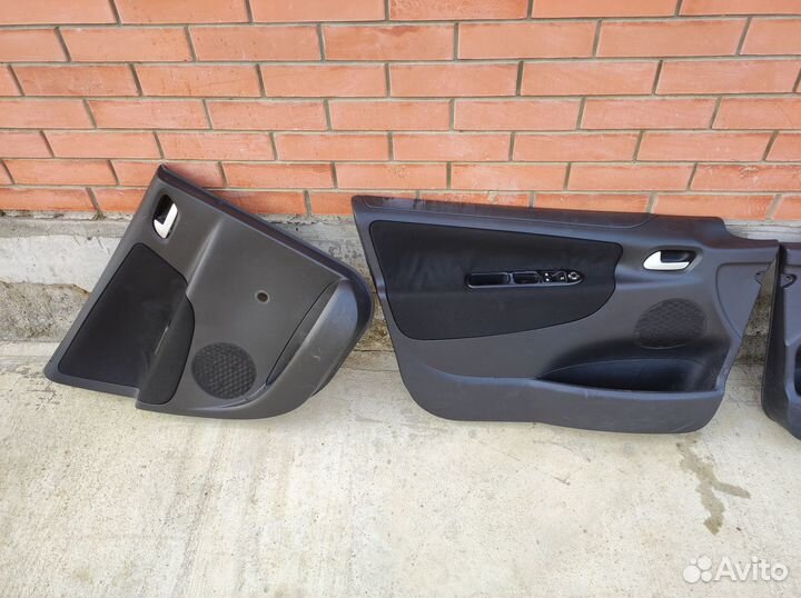 Обшивки дверей Peugeot 207