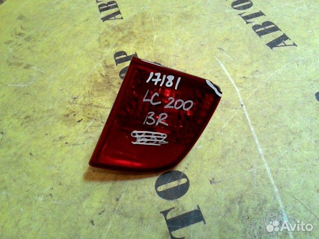 Отражатель в бампер задний правый Toyota Land