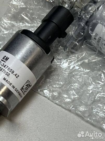 Клапан изменения фаз Круз Астра 55567050