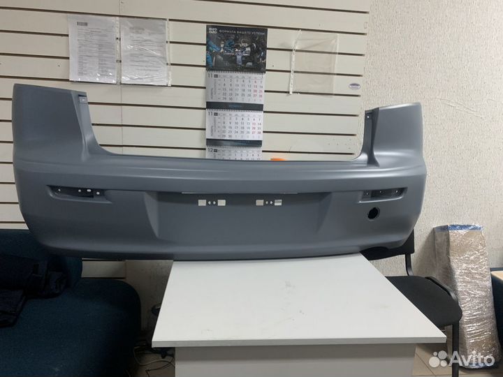 Бампер задний Mitsubishi Lancer 10 седан