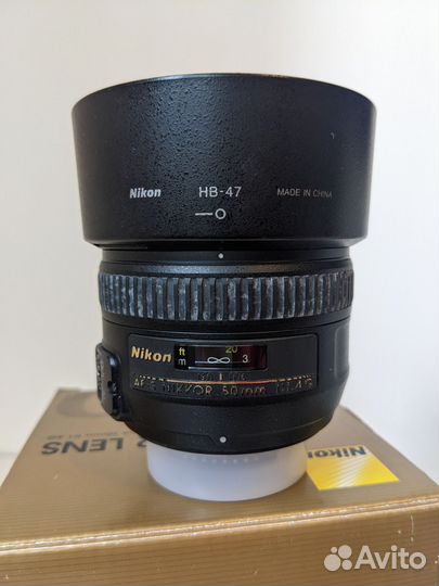 Объектив Nikon 50mm и рюкзак-слинг и чехол