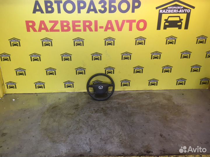 Руль mazda familia