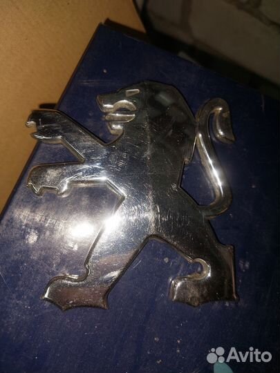 Эмблема peugeot