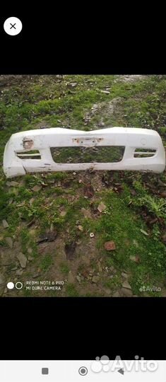 Бампер Mazda Demio