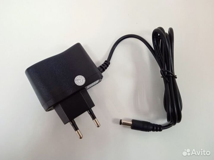 Блок питания16bit/8bit 9v 600mA новый