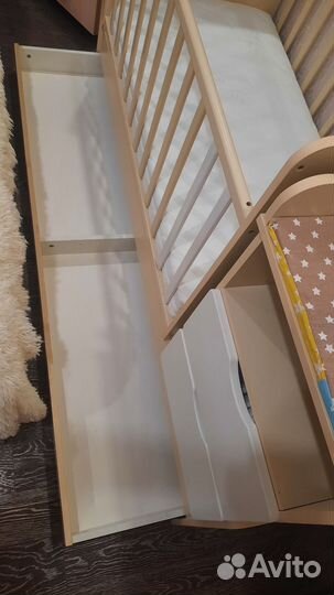 Детская кроватка с поперечным маятником