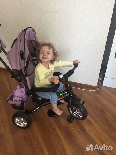 Трехколесный велосипед с ручкой