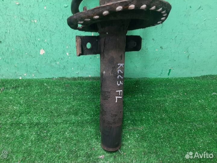 Стойка амортизатора передняя левая Renault Megane