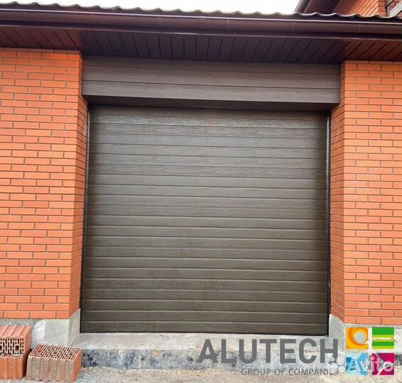 Секционные ворота для гаража alutech