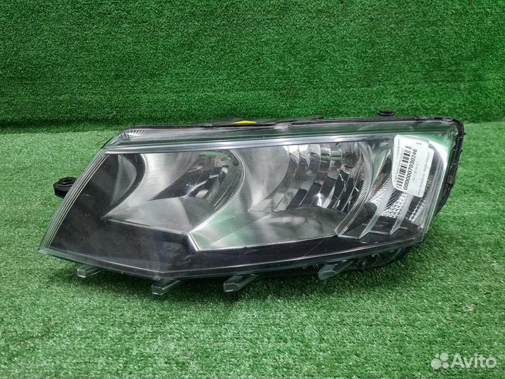 Фара левая Skoda Octavia