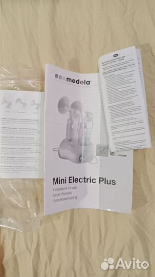Молокоотсос medela электрический