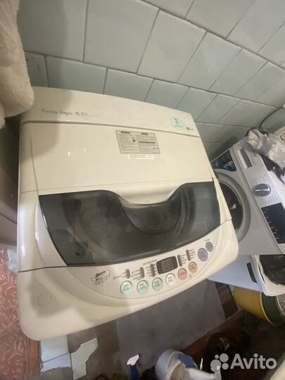 Стиральная машина с вертикальной загрузкой