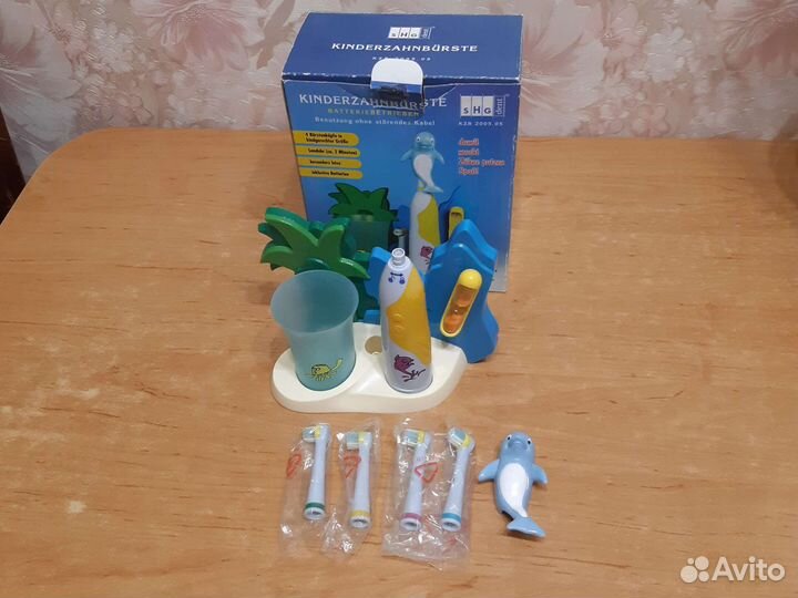 Электронная зубная щетка