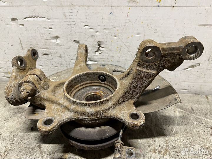 Кулак передний левый Kia Sportage 3 SL 10-16г