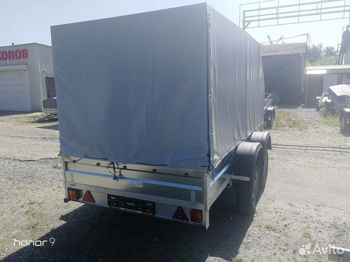 Прицеп Титан 3015 2-х осный с высоким тентом