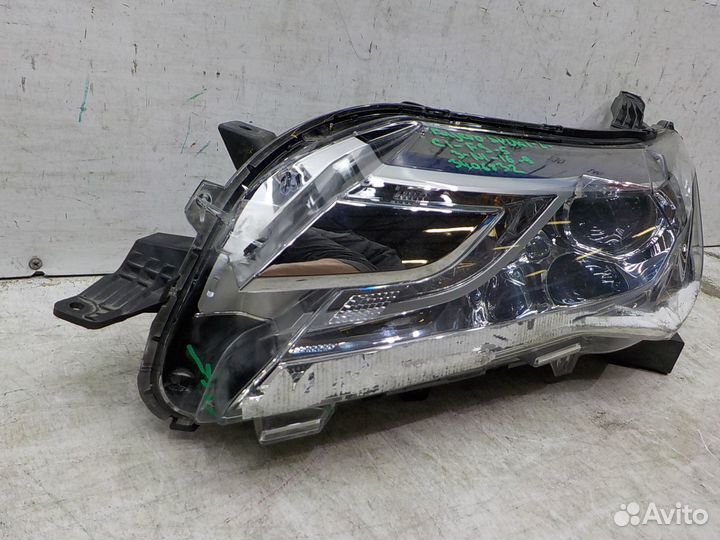 Фара левая Mitsubishi Pajero Sport