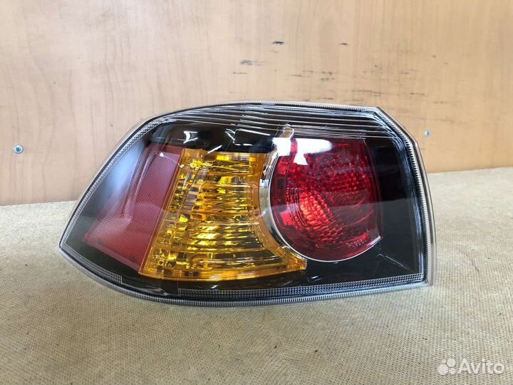 Фонарь задний левый Mitsubishi lancer X черный