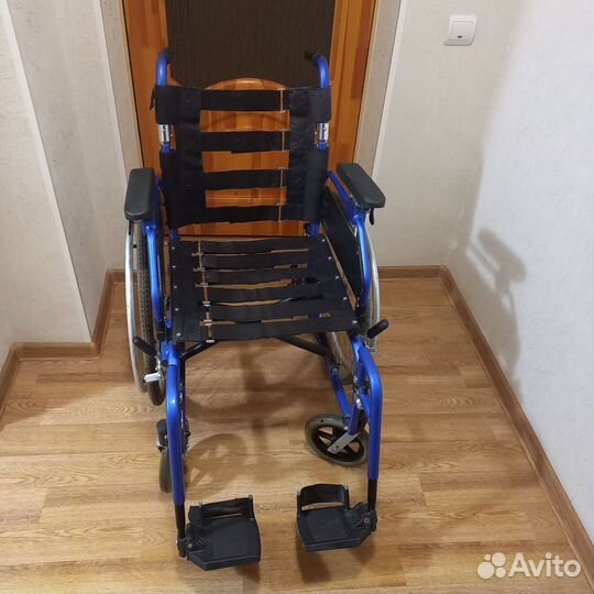 Инвалидная коляска