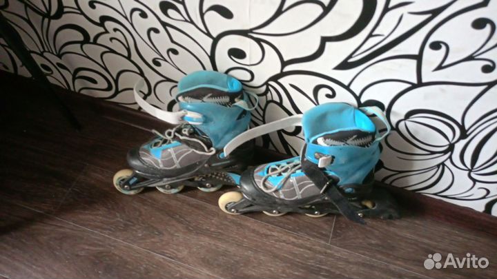 Роликовые коньки