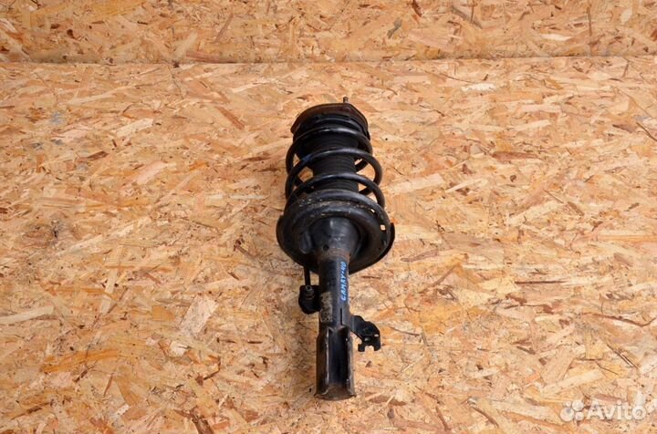 Стойка амортизатора передняя правая Toyota Camry