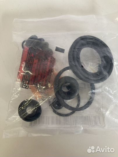 Ремкомплект тормозного суппорта задний