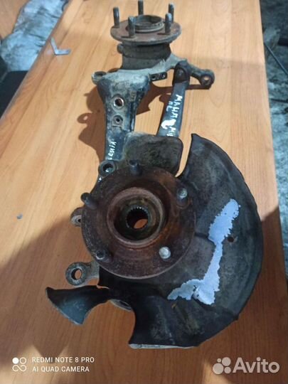 Кулак поворотный передний правый левый Mazda Mille